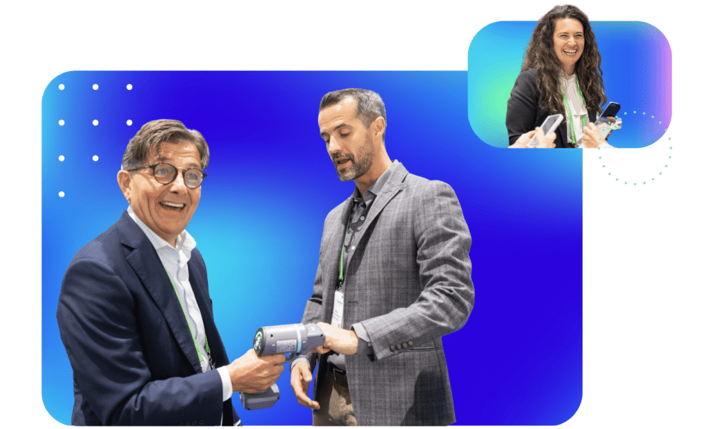 Two business men with medtech and one woman event attendee smiling